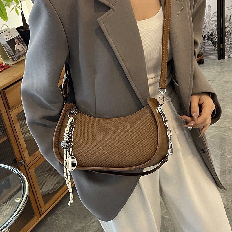 The Vienna Half-Moon Leather Sling Bag